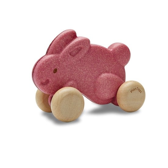 Lapin à pousser Rose  de Plan Toys