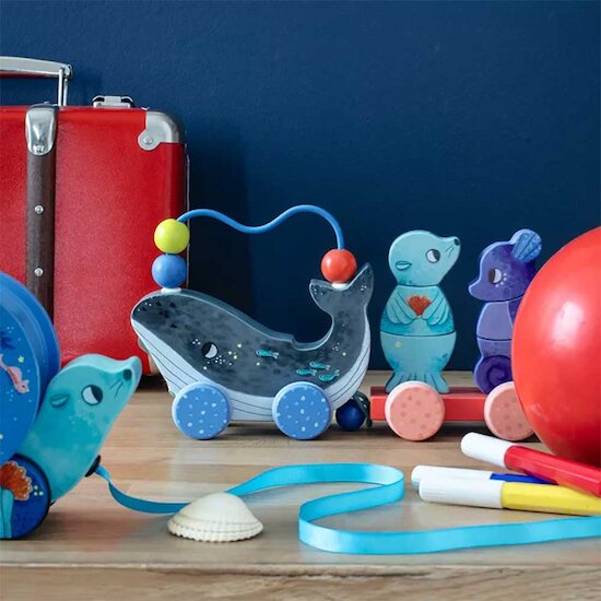 Les Aventures de Paulie Train d'activités à tirer en bois   de Moulin Roty